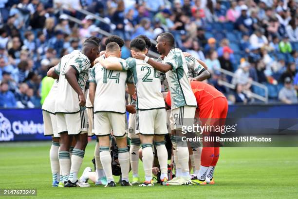 Portland Timbers in a pre game huddle during a game between Portland Timbers and Sporting Kansas City at Children's Mercy Park on April 7, 2024 in...