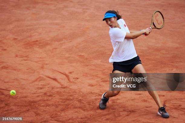 Zheng Qinwen of China attends a training session ahead of the Billie Jean King Cup 2024 Asia-Oceania Group I campaign at the Moon Island Clay Park on...