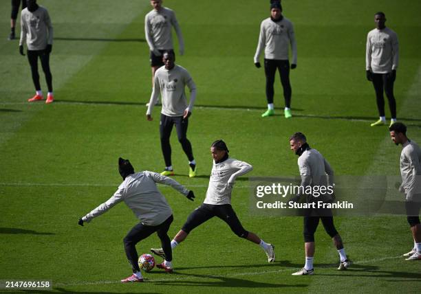 Players of PSG in action during a training session at PSG Campus on April 09, 2024 in Paris, France.