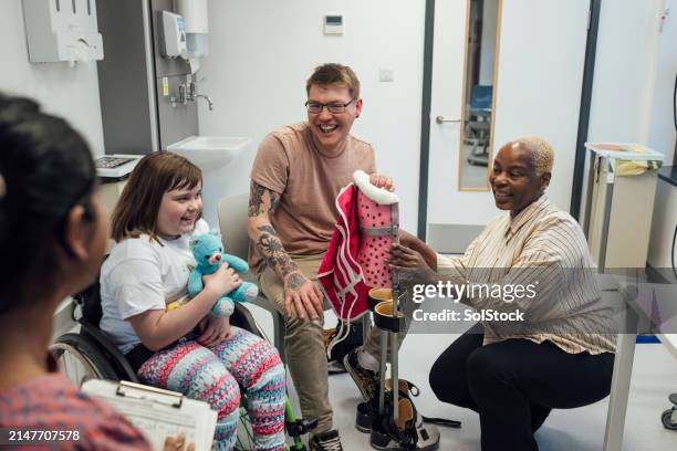 positive termine im krankenhaus - manschette stock-fotos und bilder