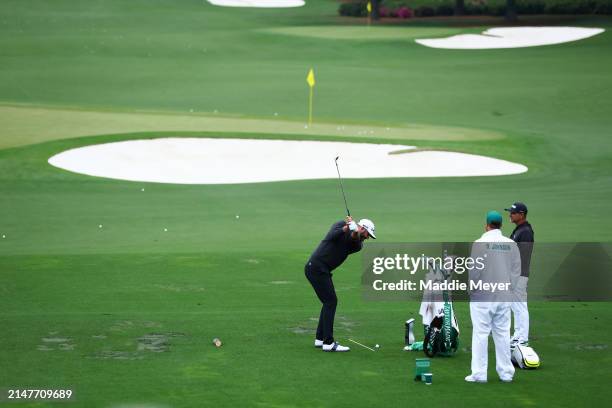 Dustin Johnson of the United States warms up in the practice area prior to the 2024 Masters Tournament at Augusta National Golf Club on April 09,...