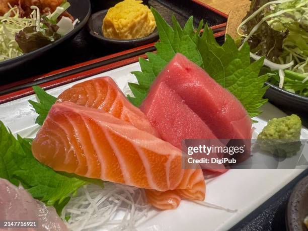 freshness unveiled: salmon and tuna sashimi delight in shiagawa of shibaura - unveiled stock pictures, royalty-free photos & images