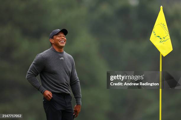 Tiger Woods of the United States laughs during a practice round prior to the 2024 Masters Tournament at Augusta National Golf Club on April 09, 2024...