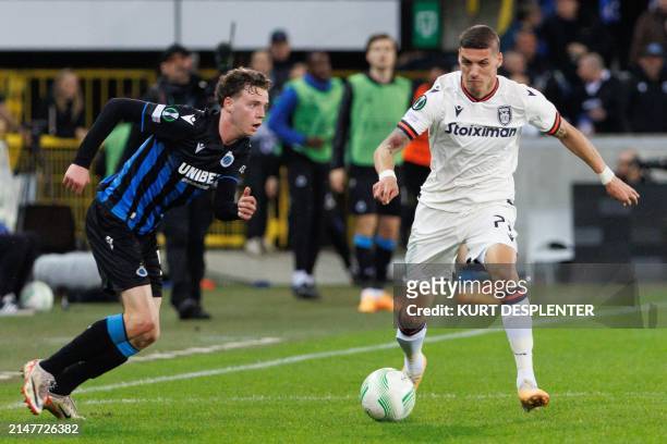 Club's Maxime De Cuyper and PAOK's Kiril Despodov fight for the ball during a soccer game between Belgian Club Brugge KV and Greek PAOK FC...