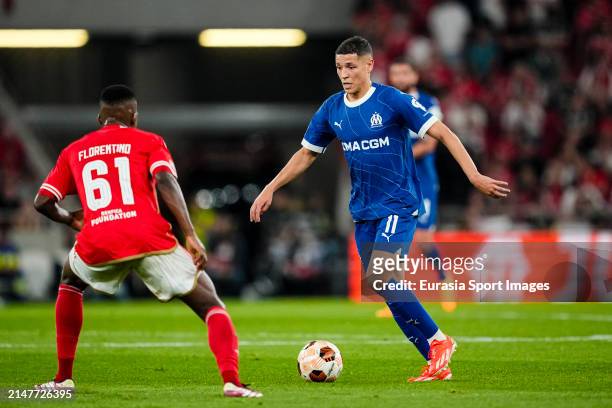 Amine Harit of Marseille plays against Florentino Morris of Benfica during the UEFA Europa League 2023/24 Quarter-Final first leg match between SL...