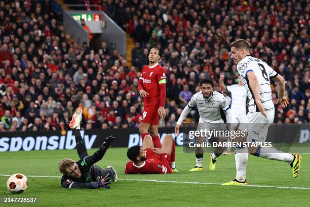 Atalanta's Croatian midfielder Mario Pasalic scores the team's third goal during the UEFA Europa League quarter-final first leg football match...