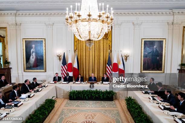 President Joe Biden, center, speaks during a trilateral meeting with Ferdinand Marcos Jr., Philippines' president, left, and Fumio Kishida, Japan's...