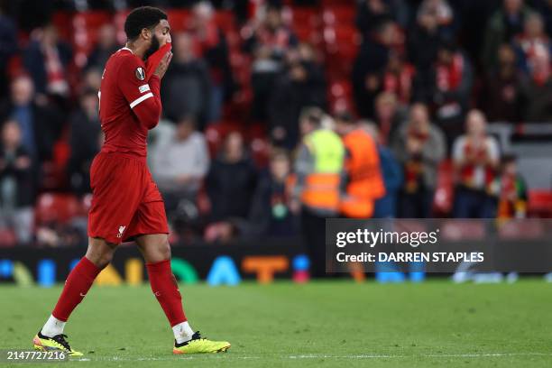 Liverpool's English defender Joe Gomez reacts after the UEFA Europa League quarter-final first leg football match between Liverpool and Atalanta at...