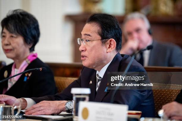 Japanese Prime Minister Fumio Kishida speaks during a trilateral meeting with U.S. President Joe Biden and Filipino President Ferdinand Marcos in the...