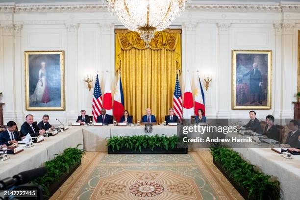 President Joe Biden holds a trilateral meeting with Japanese Prime Minister Fumio Kishida and Filipino President Ferdinand Marcos in the East Room of...