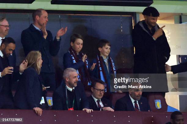Prince William, Prince of Wales and Prince George of Wales look on alongside Tyrone Mings of Aston Villa during the UEFA Europa Conference League...