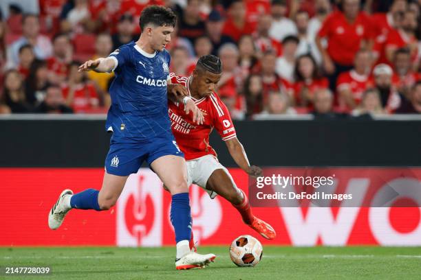 David Neres of SL Benfica, Leonardo Balerdi of Olympique Marseille battle for the ball during the UEFA Europa League 2023/24 Quarter-Final first leg...