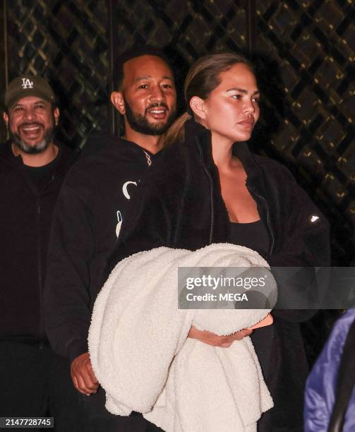 John Legend and Chrissy Teigen are seen leaving their hotel on April 11, 2024 in New York, New York.