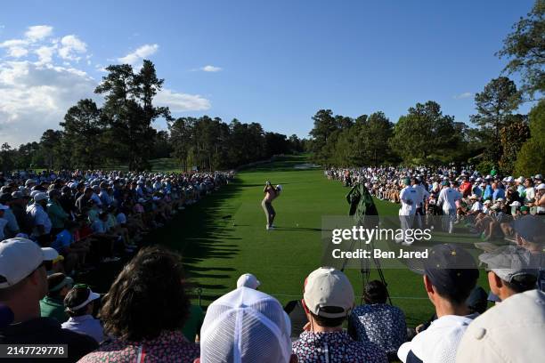 Tiger Woods prepares to hit his tee shot on the eighth hole during the first round of Masters Tournament at Augusta National Golf Club on April 11,...