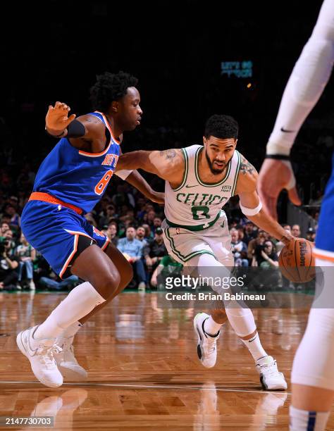 Jayson Tatum of the Boston Celtics dribbles the ball during the game against the New York Knicks on April 11, 2024 at the TD Garden in Boston,...