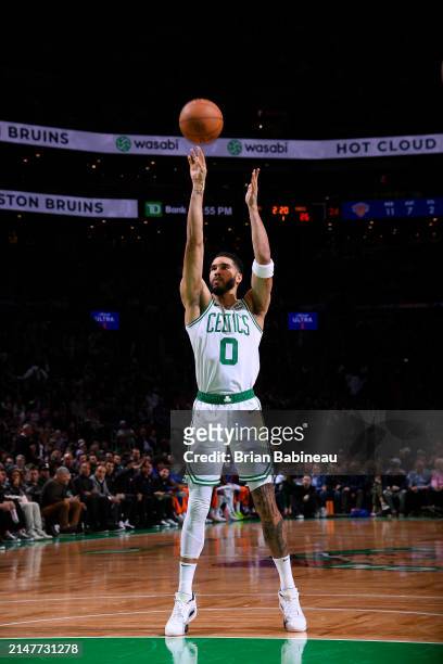 Jayson Tatum of the Boston Celtics shoots a free throw during the game against the New York Knicks on April 11, 2024 at the TD Garden in Boston,...