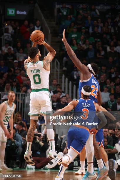 Jayson Tatum of the Boston Celtics shoots the ball during the game against the New York Knicks on April 11, 2024 at the TD Garden in Boston,...