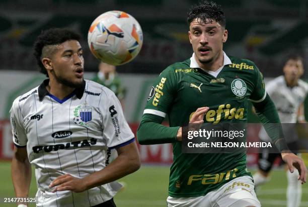 Liverpool's defender Kevin Johan Amaro and Palmeiras' Uruguayan defender Joaquin Piquerez fight for the ball during the Copa Libertadores group stage...