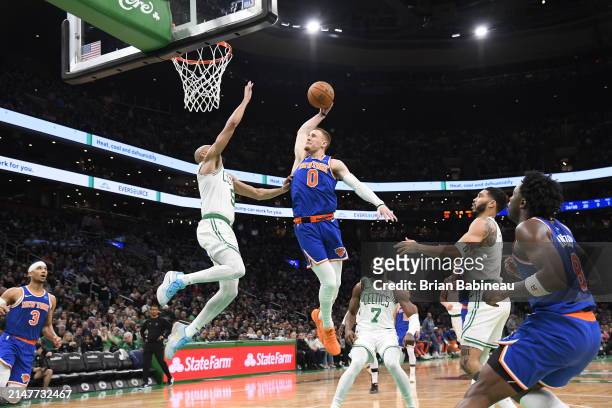 Donte Divincenzo of the New York Knicks shoots the ball during the game against the Boston Celtics on April 11, 2024 at the TD Garden in Boston,...