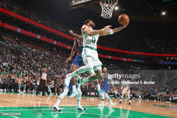 Jayson Tatum of the Boston Celtics drives to the basket during the game against the New York Knicks on April 11, 2024 at the TD Garden in Boston,...