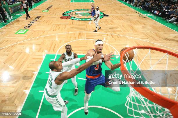 Josh Hart of the New York Knicks drives to the basket during the game against the Boston Celtics on April 11, 2024 at the TD Garden in Boston,...