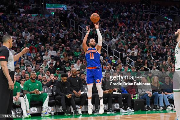 Jalen Brunson of the New York Knicks shoots a three point basket during the game against the Boston Celtics on April 11, 2024 at the TD Garden in...