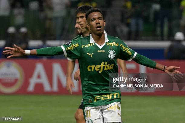 Palmeiras' forward Estevao Willian celebrates after scoring a goal during the Copa Libertadores group stage first leg football match between Brazil's...