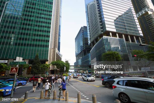Commercial buildings in the central business district in Singapore, on Thursday, April 11, 2024. Singapore's central bank kept its monetary policy...