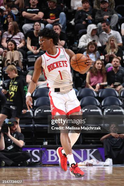 Amen Thompson of the Houston Rockets handles the ball during the game against the Utah Jazz on April 11, 2024 at Delta Center in Salt Lake City,...