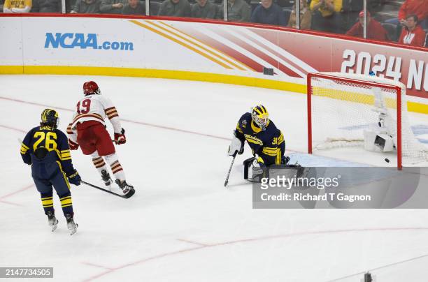 Cutter Gauthier of the Boston College Eagles scores against the Michigan Wolverines in the second period during the NCAA Men's Hockey Frozen Four...