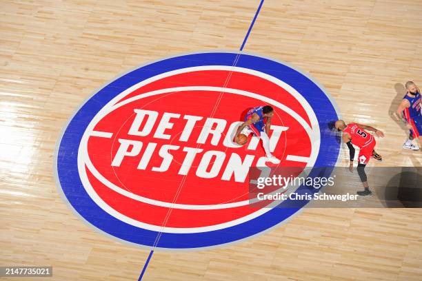 Marcus Sasser of the Detroit Pistons dribbles the ball during the game against the Chicago Bulls on April 11, 2024 at Little Caesars Arena in...