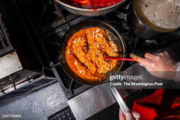 Cooking Jollof Risotto from Almeda in Washington, DC on January 20, 2024