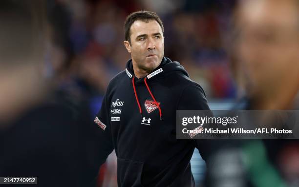 Brad Scott, Senior Coach of the Bombers looks on during the 2024 AFL Round 05 match between the Western Bulldogs and the Essendon Bombers at Marvel...