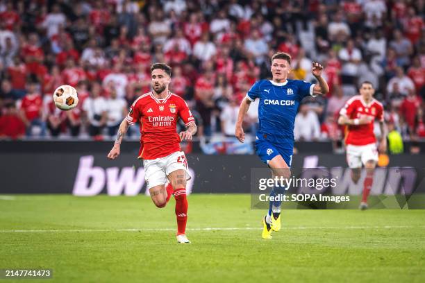 Rafa Silva of SL Benfica with Quentin Merlin of Olympique de Marseille in action during the UEFA Europa League quarterfinal first leg match between...