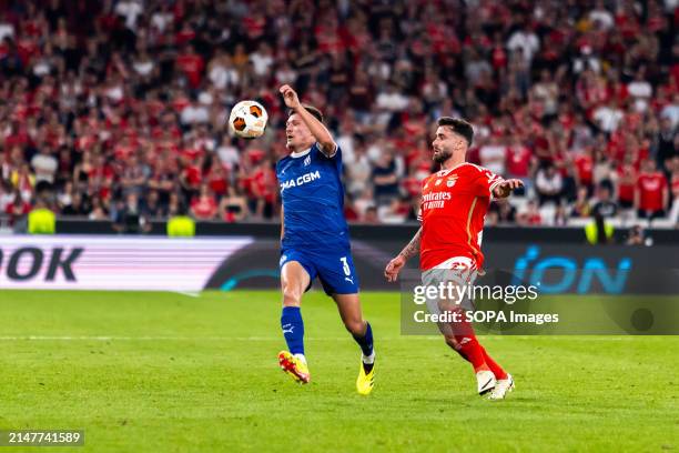 Quentin Merlin of Marseille and Rafa Silva of Benfica seen in action during the UEFA Europa League 2023/24 match between SL Benfica and Olympique de...