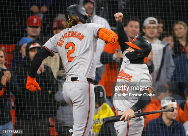 Boston, MA Baltimore Orioles shortstop Gunnar Henderson celebrates a two run home run with teammate outfielder Austin Hays in the tenth inning.