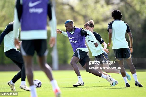 Nicolas Jackson and Harrison Murray-Campbell of Chelsea during a training session at Chelsea Training Ground on April 12, 2024 in Cobham, England.