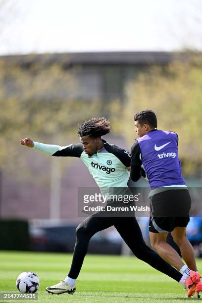 Carney Chukwuemeka and Thiago Silva of Chelsea during a training session at Chelsea Training Ground on April 12, 2024 in Cobham, England.