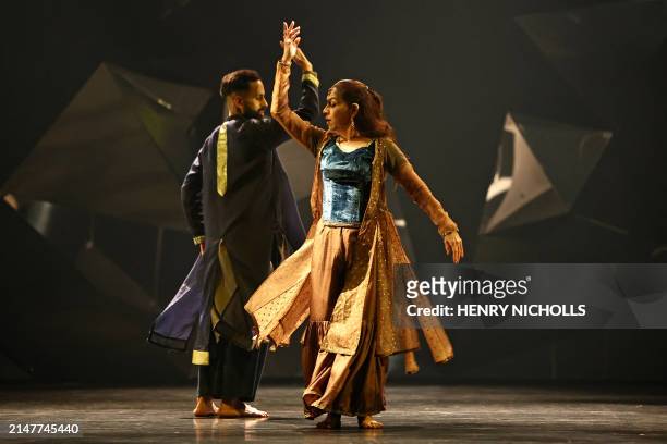 British-born Indian choreographer and dancer Aakash Odedra and Indian choreographer and dancer Aditi Mangaldas perform during a dress rehearsal for...