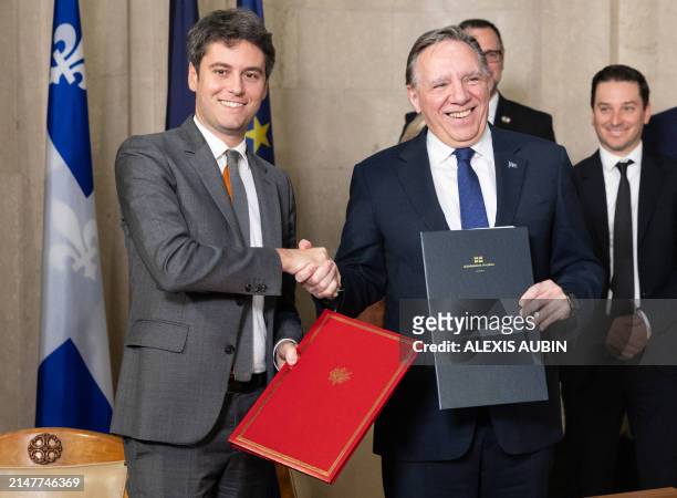 French Prime Minister Gabriel Attal and Quebec Prime Minister Francois Legault sign bilateral agreements between Quebec and France at the Quebec...