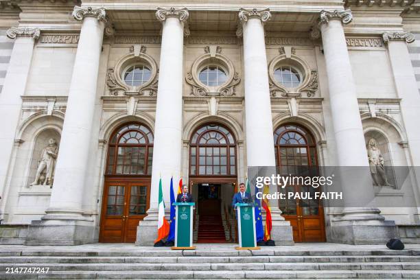 Ireland's Prime Minister Simon Harris and Spain's Prime Minister Pedro Sanchez attend a joint press conference after their meeting at Government...