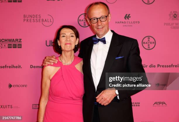 April 2024, Berlin: Friedrich Merz, Federal Chairman of the CDU, and his wife Charlotte Merz attend the 71st Federal Press Ball. The ball is...