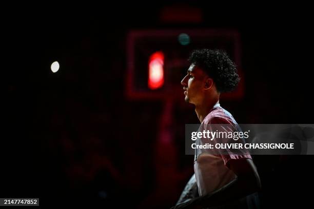 Bourg-en-Bresse's French forward Zaccharie Risacher looks on during the Eurocup second leg basketball match between JL Bourg and Paris basketball at...