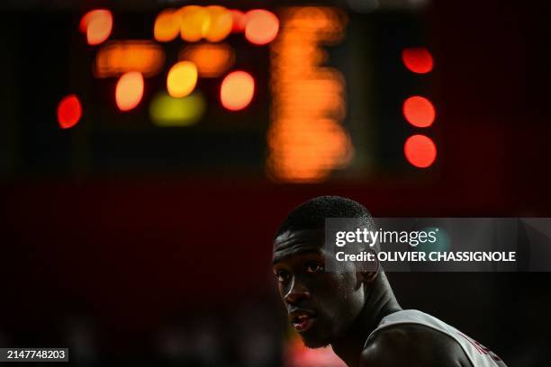 Bourg-en-Bresse's French centre Bodian Massa looks on during the Eurocup second leg basketball match between JL Bourg and Paris basketball at the...
