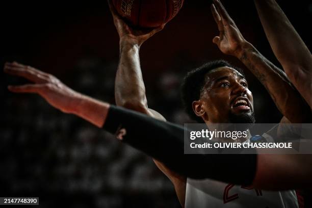 Bourg-en-Bresse's Canadian forward Isiaha Mike fights for the ball during the Eurocup second leg basketball match between JL Bourg and Paris...