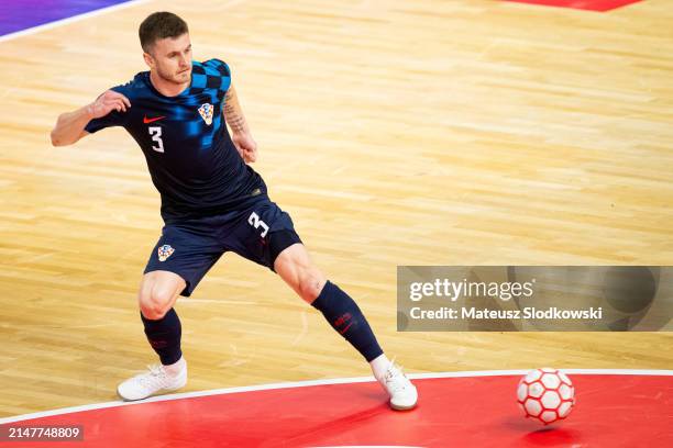 Kristian Cekol of Croatia controls the ball during the FIFA World Cup 2024 Play Off match between Poland and Croatia on April 12, 2024 in Koszalin,...