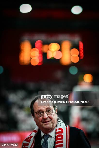 France's former President Francois Hollande attends the Eurocup second leg basketball match between JL Bourg and Paris basketball at the Ekinox arena...