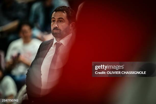 Bourg-en-Bresse's French coach Frederic Fauthoux looks on during the Eurocup second leg basketball match between JL Bourg and Paris basketball at the...