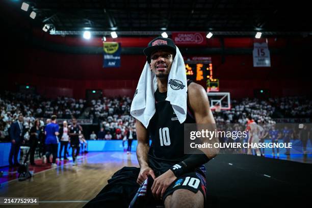 Paris' French guard Mehdy Ngouama reacts after winning during the Eurocup second leg basketball match between JL Bourg and Paris basketball at the...
