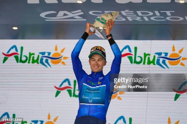 Alexey Lutsenko of Kazakhstan and Team Astana Qazaqstan is celebrating his victory in the general classification, wearing the blue jersey, on the...